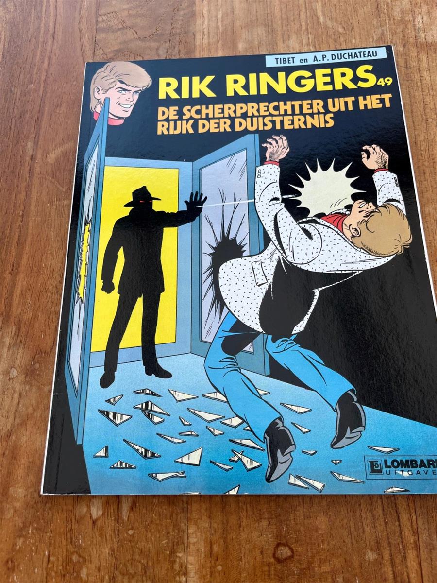 Rik Ringers -Nr.49-De scherpschutter uit het rijk der duisternis - sc- Eerste druk 1991